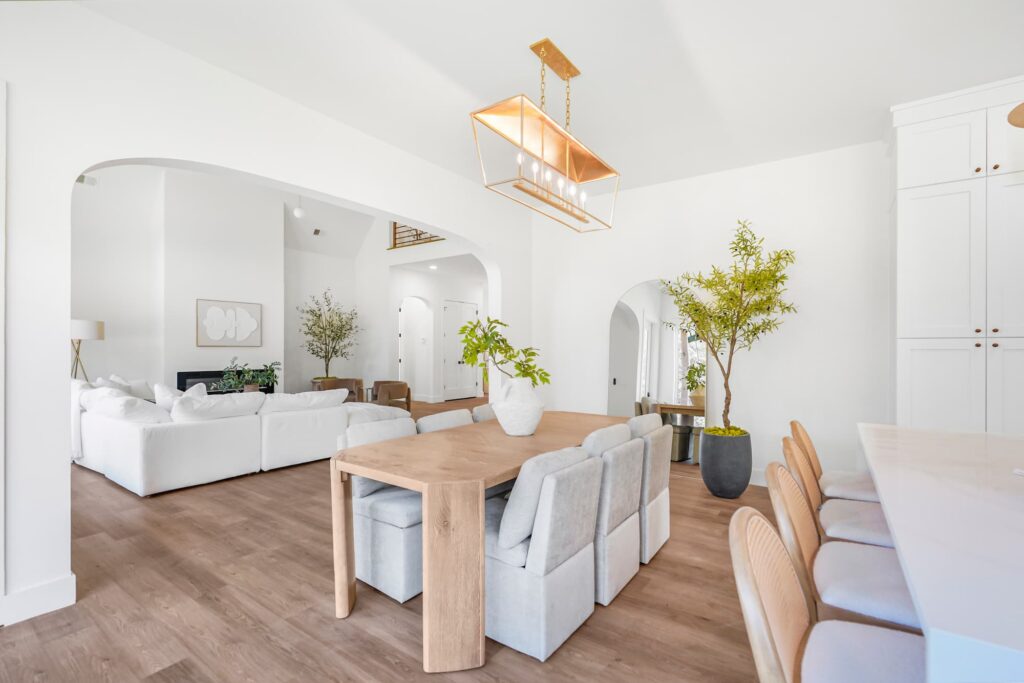 Open dining area with arched doorways in a Greenville semi-custom home
